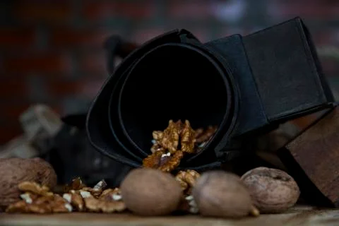 Walnuts on Rustic Old Table with Vintage Hand Grinder Stock Photos