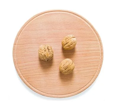 Walnuts on rustic  wooden table Stock Photos