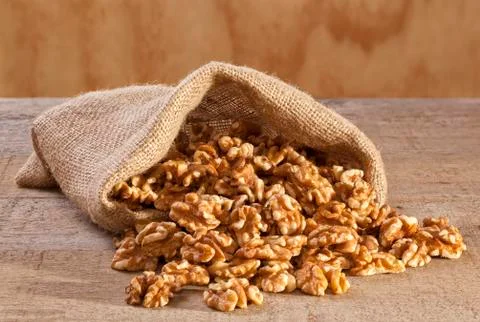 Walnuts in a sack Stock Photos