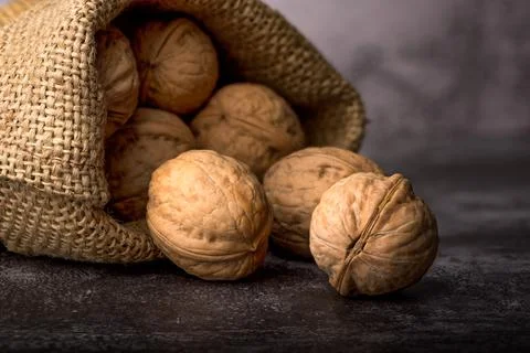 Walnuts in sack Stock Photos
