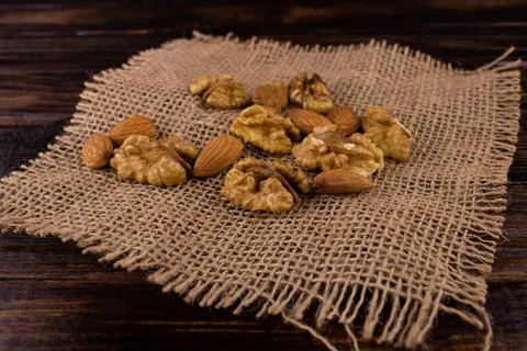 Walnuts scattered on the tablecloth Stock Photos