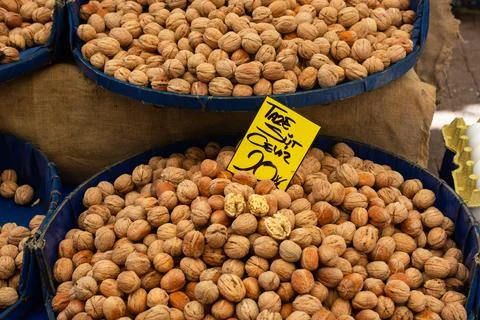 Walnuts in shell heap pattern as organic food background 写真素材