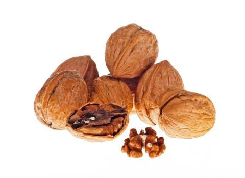 Walnuts in the shell on white background. food Stock Photos
