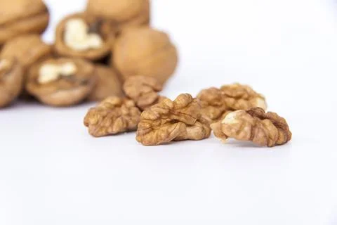 Walnuts in a shell on a white background. Healthy nuts. Stock Photos