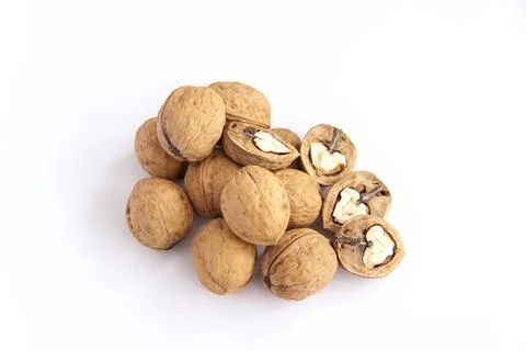 Walnuts in a shell on a white background. Healthy nuts. Foto stock