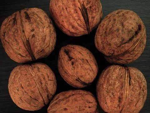 Walnuts on a table in contrast colors Stock-Fotos