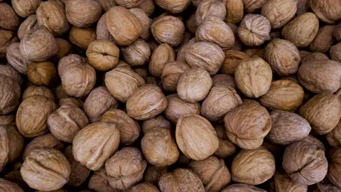Walnuts in top view Stock Footage 248853316