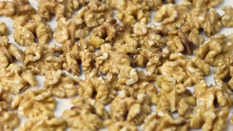 Walnuts on Turning Plate 45 Degree Angle  Background Video Stock Footage 162540791