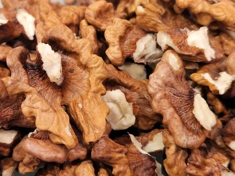 Walnuts. Walnut kernels. Background of ripe walnut kernels Stock Photos
