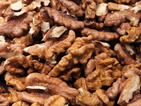 Walnuts. Walnut kernels. Background of ripe walnut kernels Foto stock