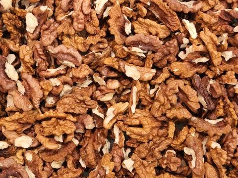 Walnuts. Walnut kernels. Background of ripe walnut kernels Stock Photos