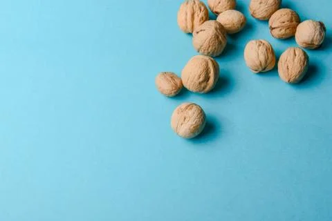 Walnuts, walnuts close-up, walnuts on blue background, Stock Photos
