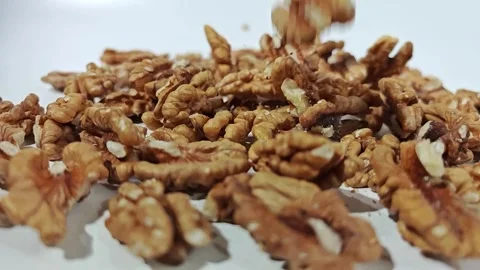 Walnuts on white background isolated studio shot Stock Footage 340030729