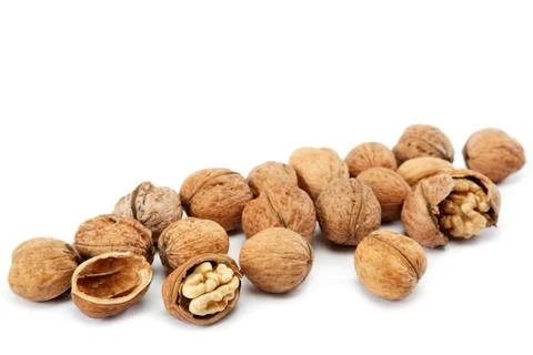 Walnuts on a white background. Stock Photos