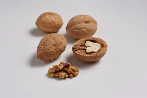 Walnuts on a white background, a very useful product Stock Photos