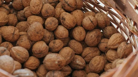 Walnuts in a wicker basket Video stock 103378790