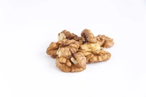 Walnuts without shells on a white background. Healthy nuts. Foto stock