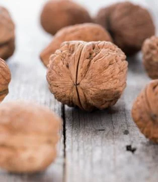 Walnuts on wood Stock Photos