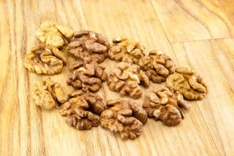 Walnuts on wood. Stock Photos