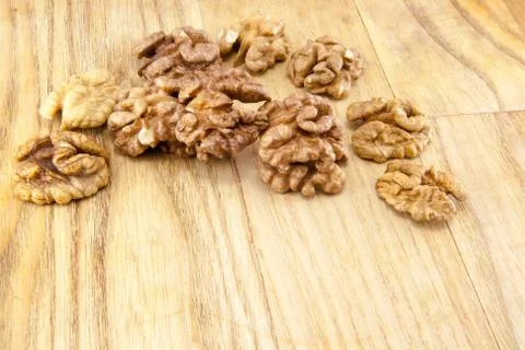 Walnuts on wood. Stock Photos
