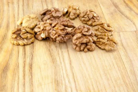 Walnuts on wood. Stock Photos