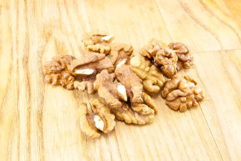 Walnuts on wood. Stock Photos