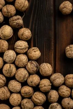 Walnuts on a wooden background Stock Photos