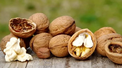Walnuts on wooden table Stock Footage 41921624