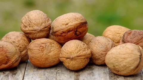 Walnuts on wooden table Stock Footage 41921666