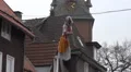 Walpurgis witch zoom hanging before church tower HD Footage