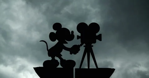 Walt Disney Studios Disneyland Mickey Mouse dark clouds in strong wind Stock Footage 155008584
