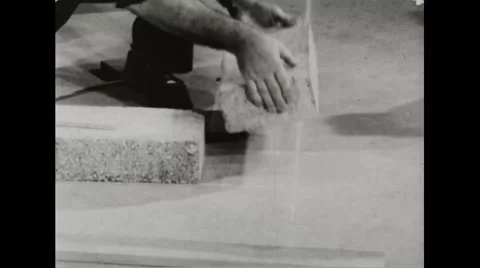 Walter Durbahn demonstrating the techniques of shelter building Stock Footage 44572186