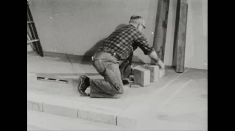Walter Durbahn demonstrating the techniques of shelter building Stock Footage 44572194