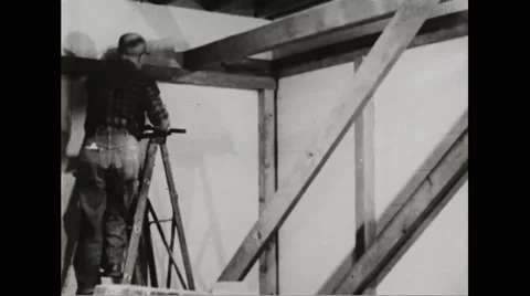 Walter Durbahn demonstrating the techniques of shelter building Stock Footage 44572847