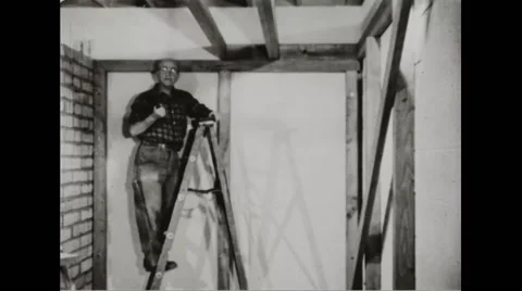 Walter Durbahn demonstrating the techniques of shelter building Stock Footage 44572878