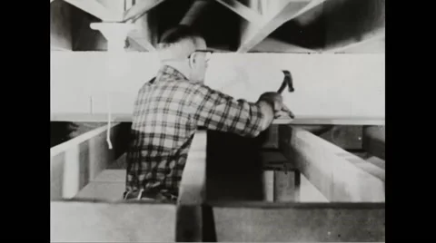 Walter Durbahn demonstrating the techniques of shelter building Stock Footage 44572892