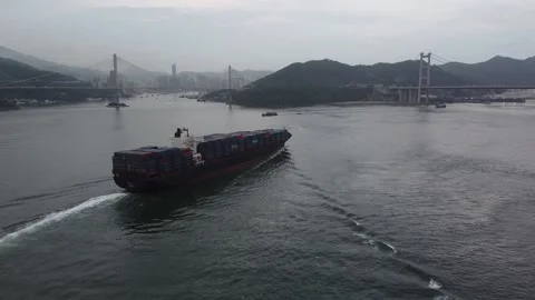 Wan Hai Container Ship sailing at Tsing Ma Bridge, Hong Kong, Aerial Footage Stock Footage 231586263