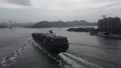 Wan Hai Container Ship sailing at Tsing Ma Bridge, Hong Kong, Aerial Footage Stock Footage 231586264