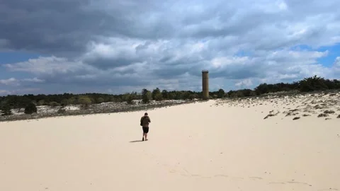 Wan Walking Through Surreal Desert Landscape in State Park Stock Footage 158957831