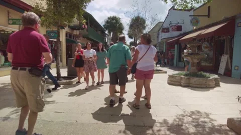 Wandering through the bustling heart of St. Augustine’s main strip, surrounded Stock Footage 332818018