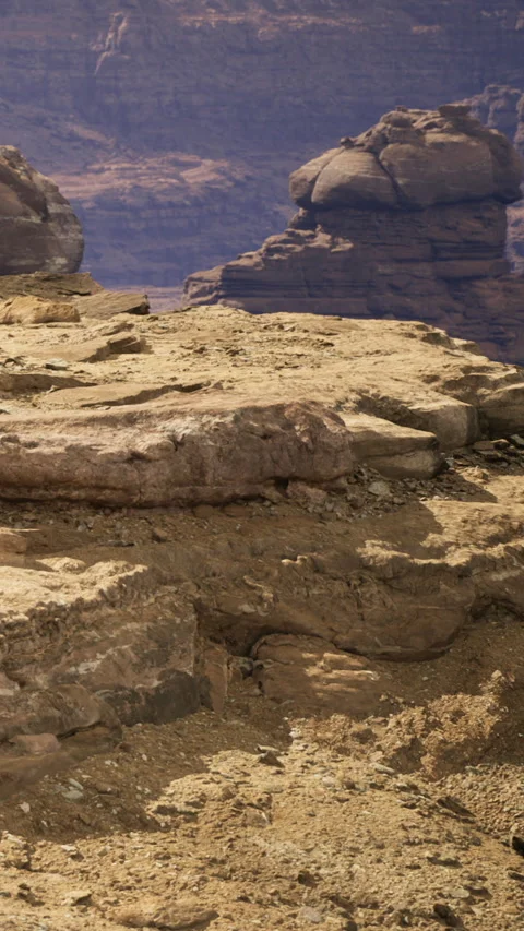 Wandering through the desert landscape with unique rock formations in view Video stock 335234362