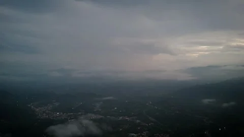 Waning Daylight Filtering Through Heavy Overcast Above Scattered Hamlets Stock Footage 316798700