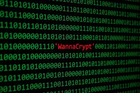 The WannaCrypt and Binary code Concept Security and Malware attack. Stock Photos