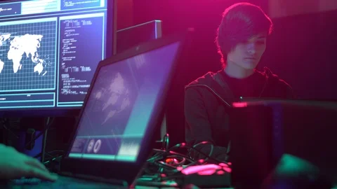 Wanted hackers coding virus ransomware using laptops and computers. Cyber attack Stock Footage 114262450