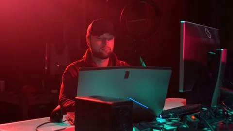 Wanted hackers coding virus ransomware using laptops and computers. Cyber attack Stock Footage 114262689