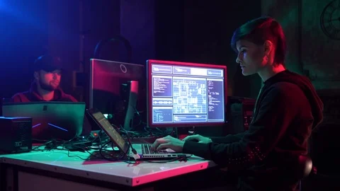 Wanted hackers coding virus ransomware using laptops and computers. Cyber attack Stock Footage 116779391