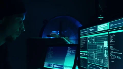 Wanted hackers coding virus ransomware using laptops and computers in the Stock Footage 304323047