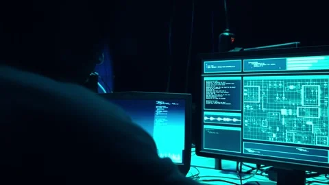 Wanted hackers coding virus ransomware using laptops and computers in the Stock Footage 304323240