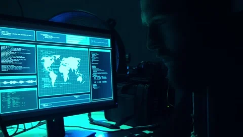 Wanted hackers coding virus ransomware using laptops and computers in the Stock Footage 304490317