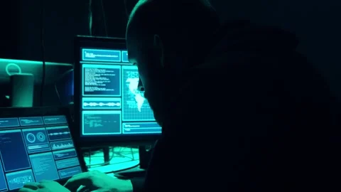 Wanted hackers coding virus ransomware using laptops and computers in the Stock Footage 304491186